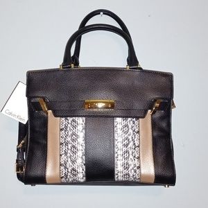 Calvin Klein leather black purse with black & white snake skin and cream pattern